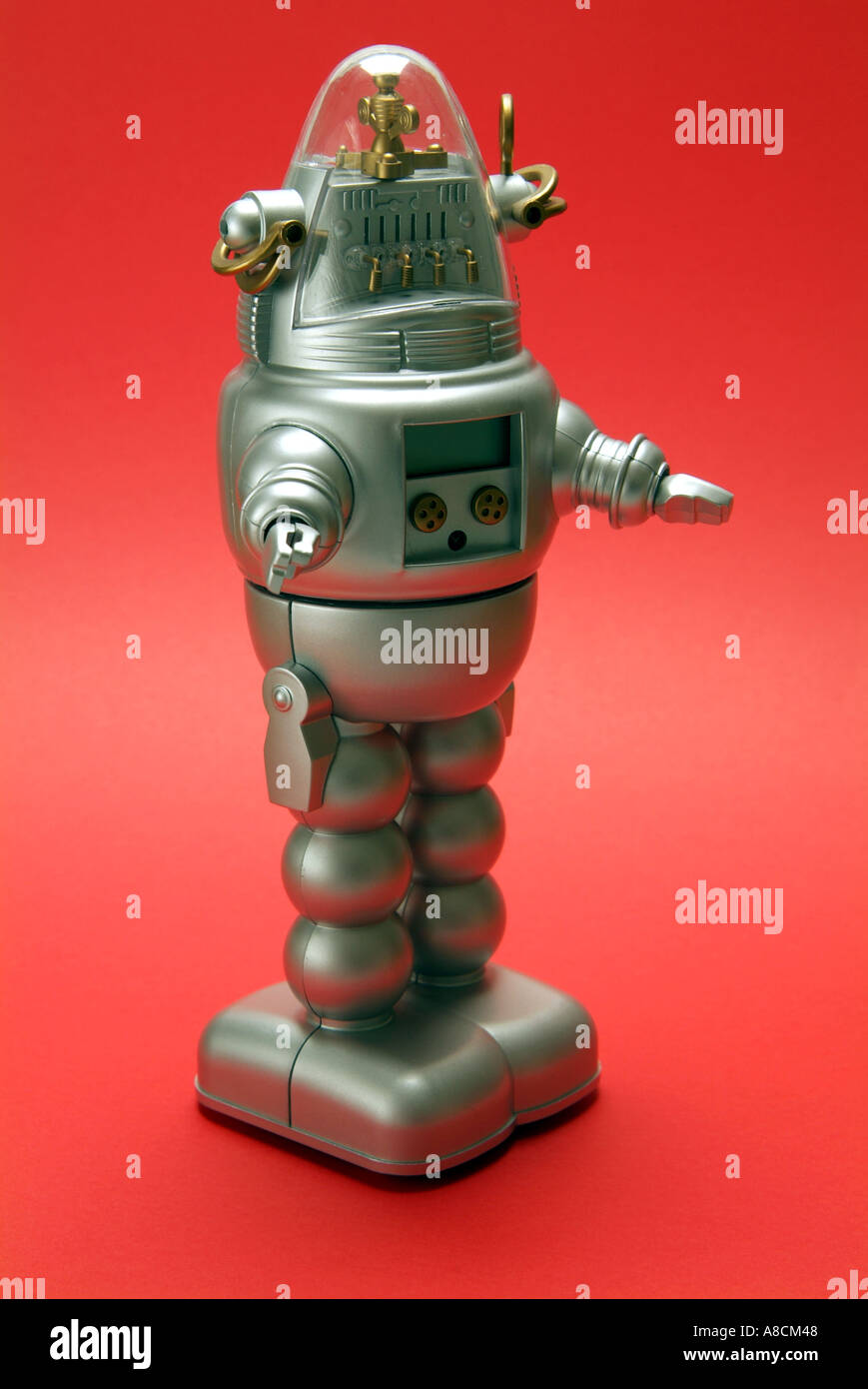 Children's plastic toy robot in the futuristic style of Robby The Robot  from film Forbidden Planet Stock Photo - Alamy