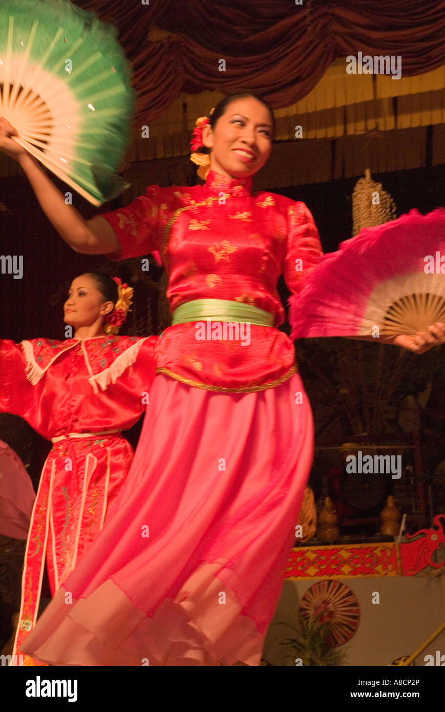 Dancers at the Sarawak Cultural Centre perform a dance of welcome for ...