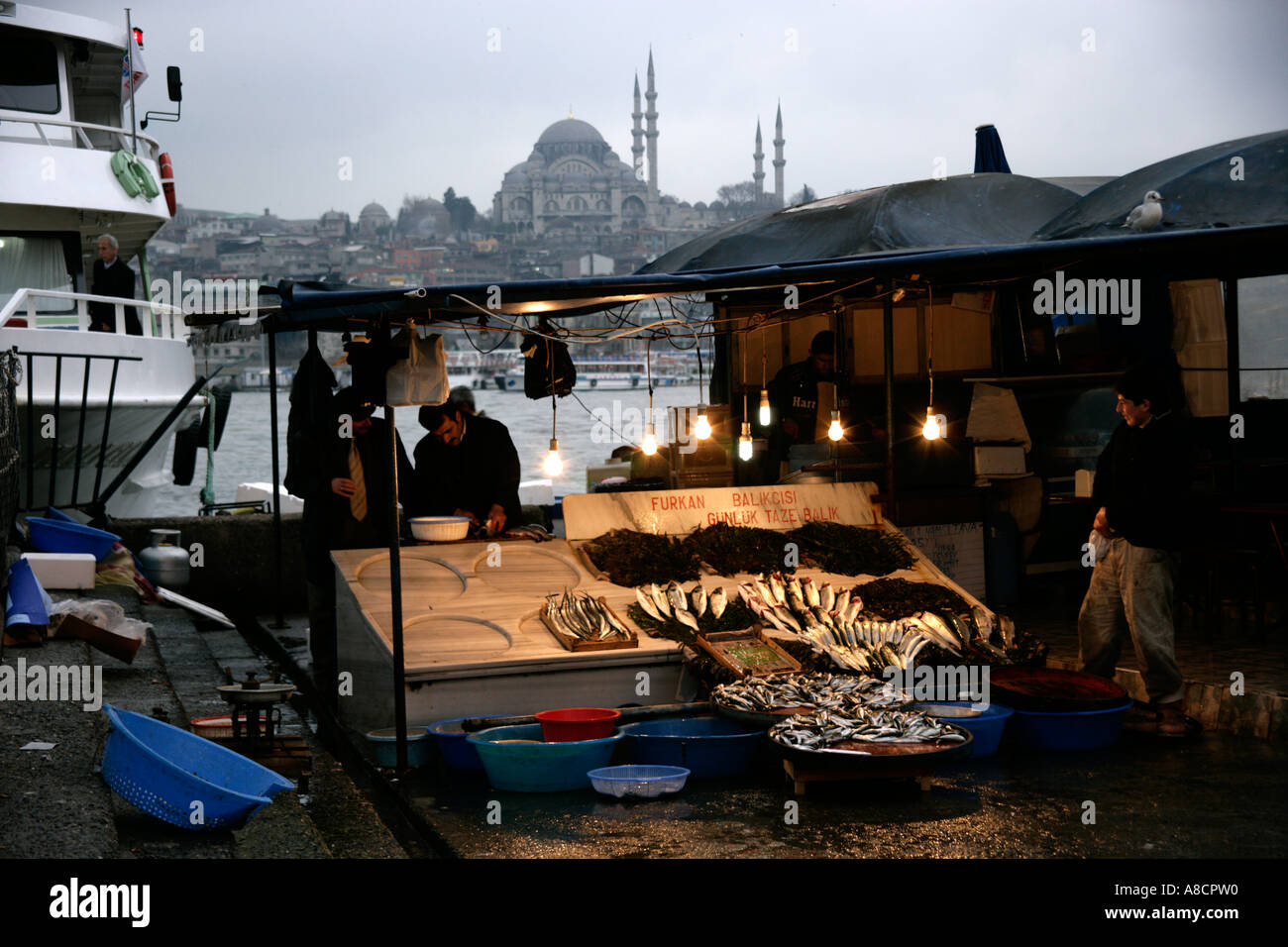 FISH MARKET AT KARAKOY WITH THE SULEYMANIYE MOSQUE IN THE BACKGROUND
