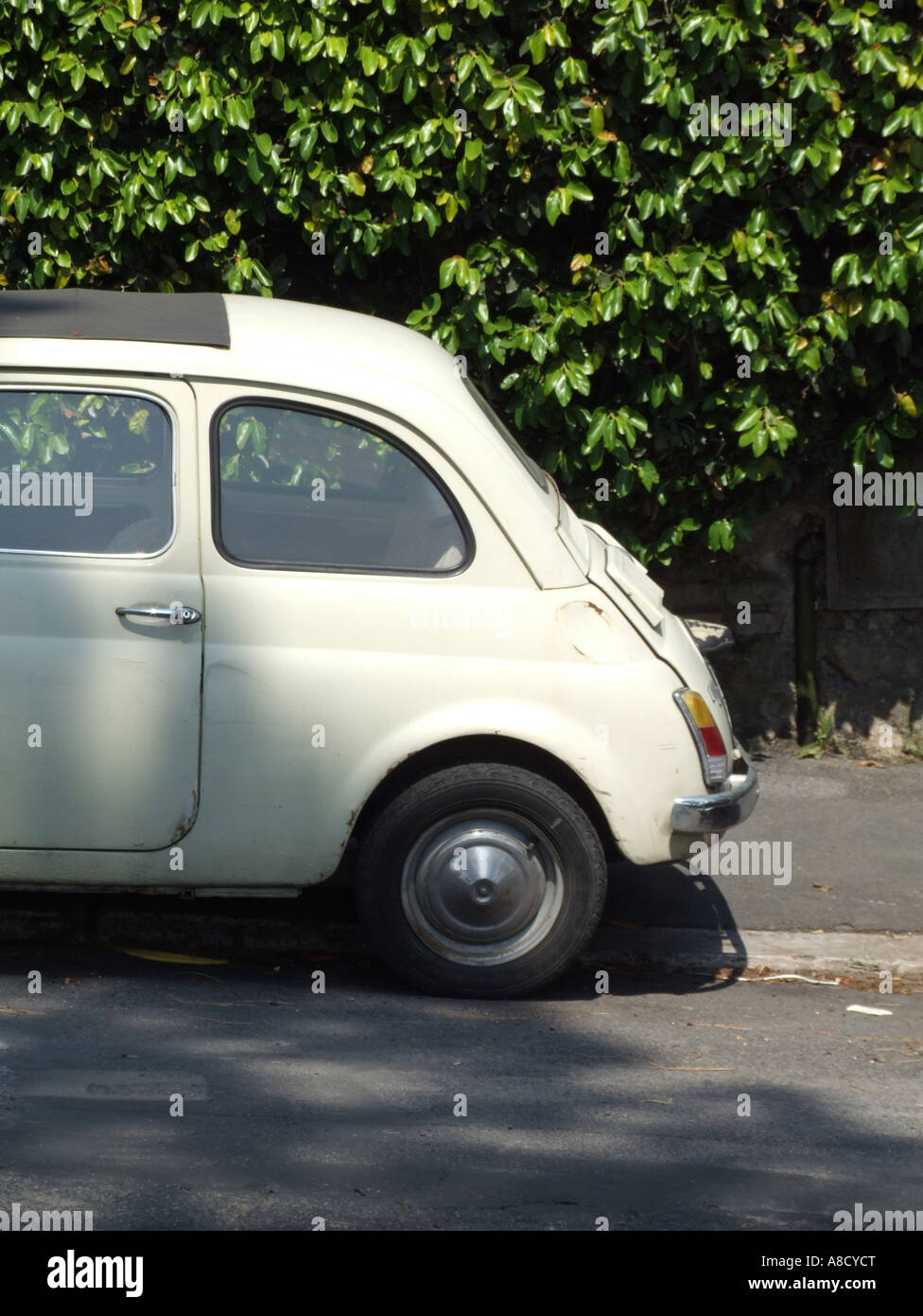 old fiat 500 car parked in street Stock Photo - Alamy