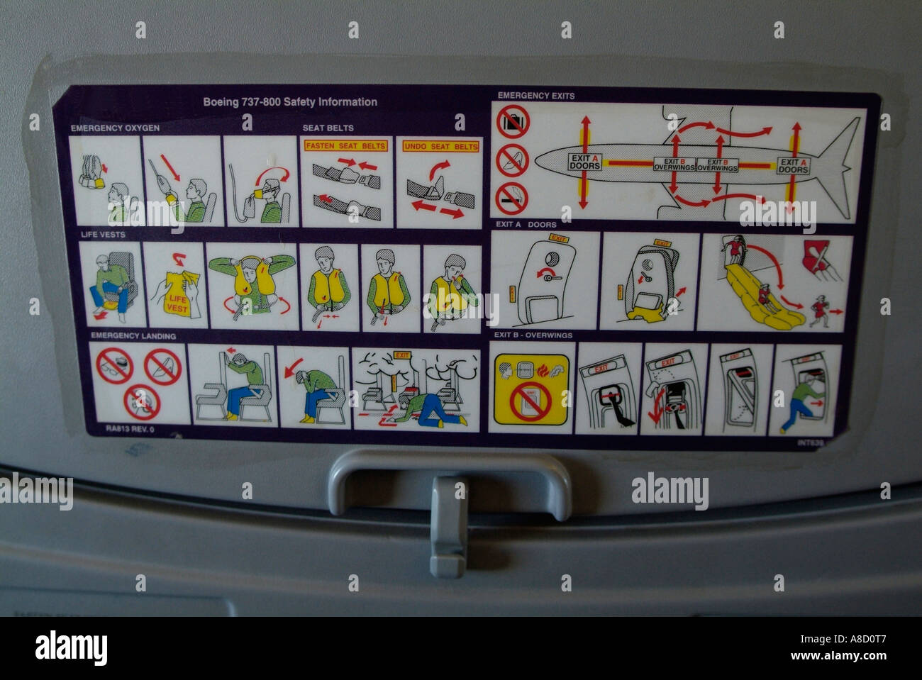 flight safety information on the rear of a seat Stock Photo Alamy