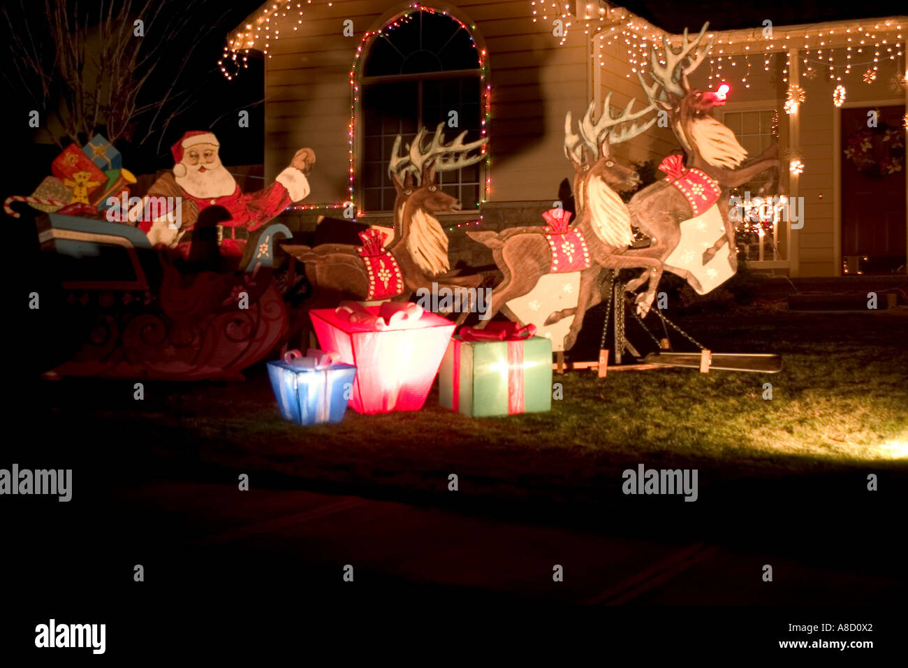 Santas Reindeer Pulling Santa In Sleigh Yard Decoration Stock
