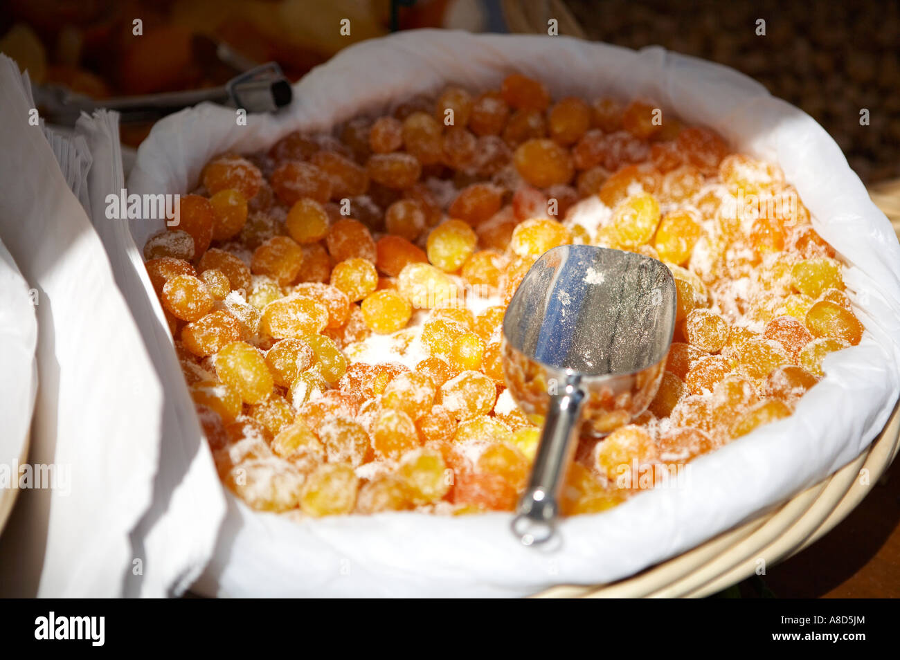Italian Kumquats in sugar for sale at a continental market Stock Photo