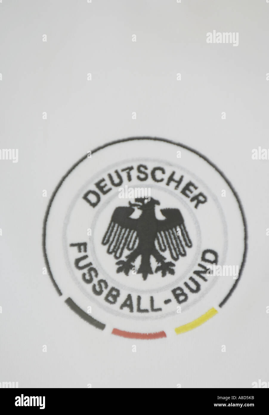 deutsche fussball bund badge crest eagle football kit top shirt white  colour color vertical Stock Photo - Alamy