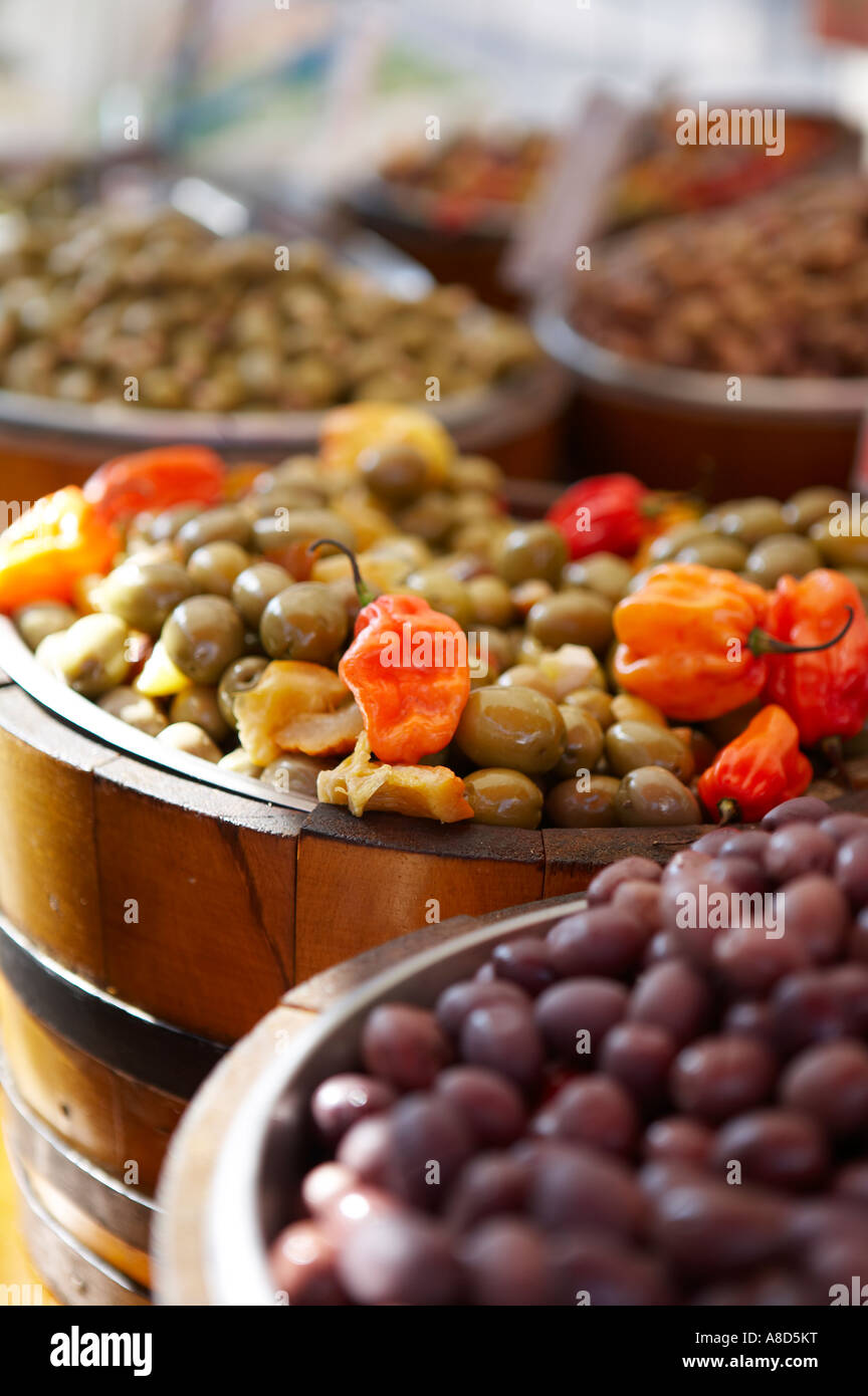 French Olives and Peppers for sale at a continental market Stock Photo