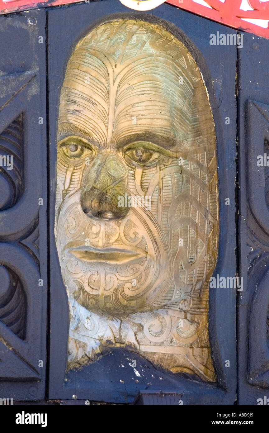 carving of maori face in wood at tattoo museum wellington north island new zealand Stock Photo