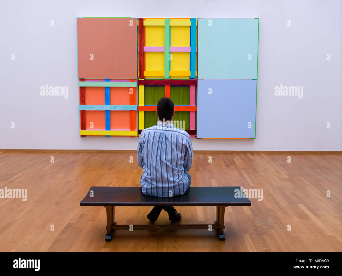 Visitor looking at abstract work at Gemeentemuseum in The Hague Netherlands Stock Photo