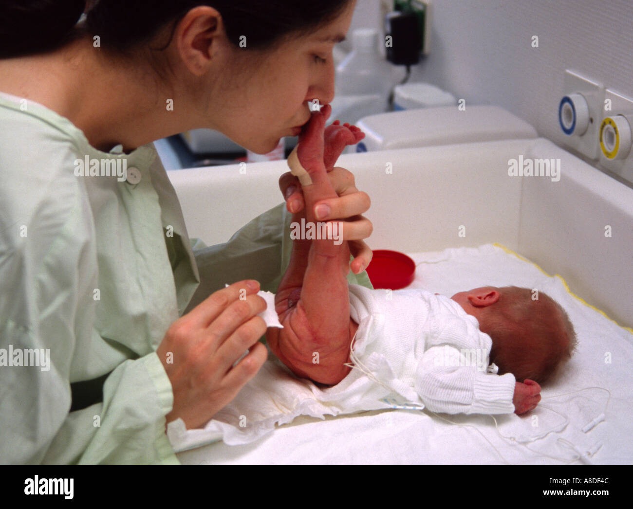 Changing a baby s nappies Stock Photo Alamy