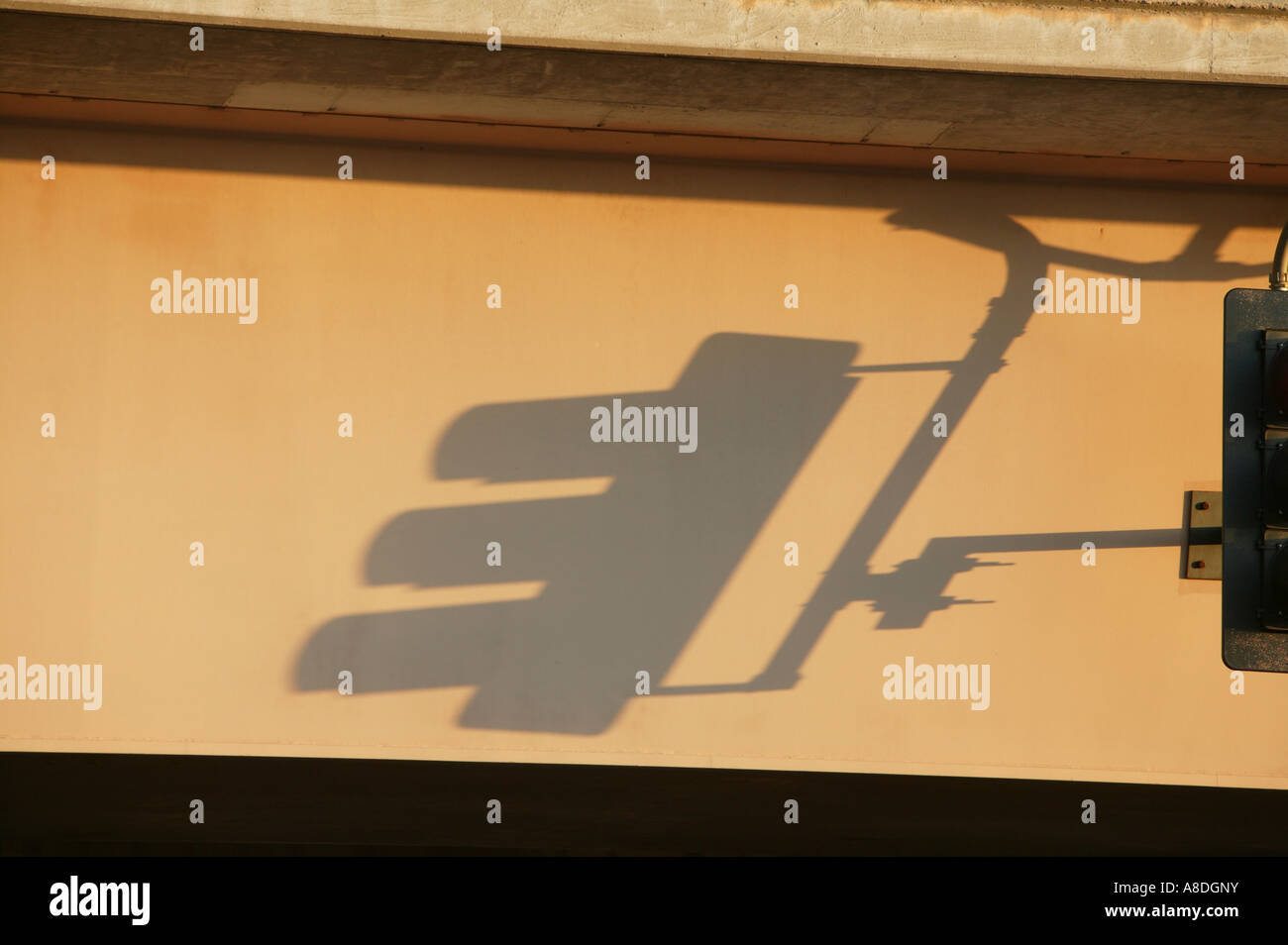 Traffic signal shadow on bridge Stock Photo - Alamy