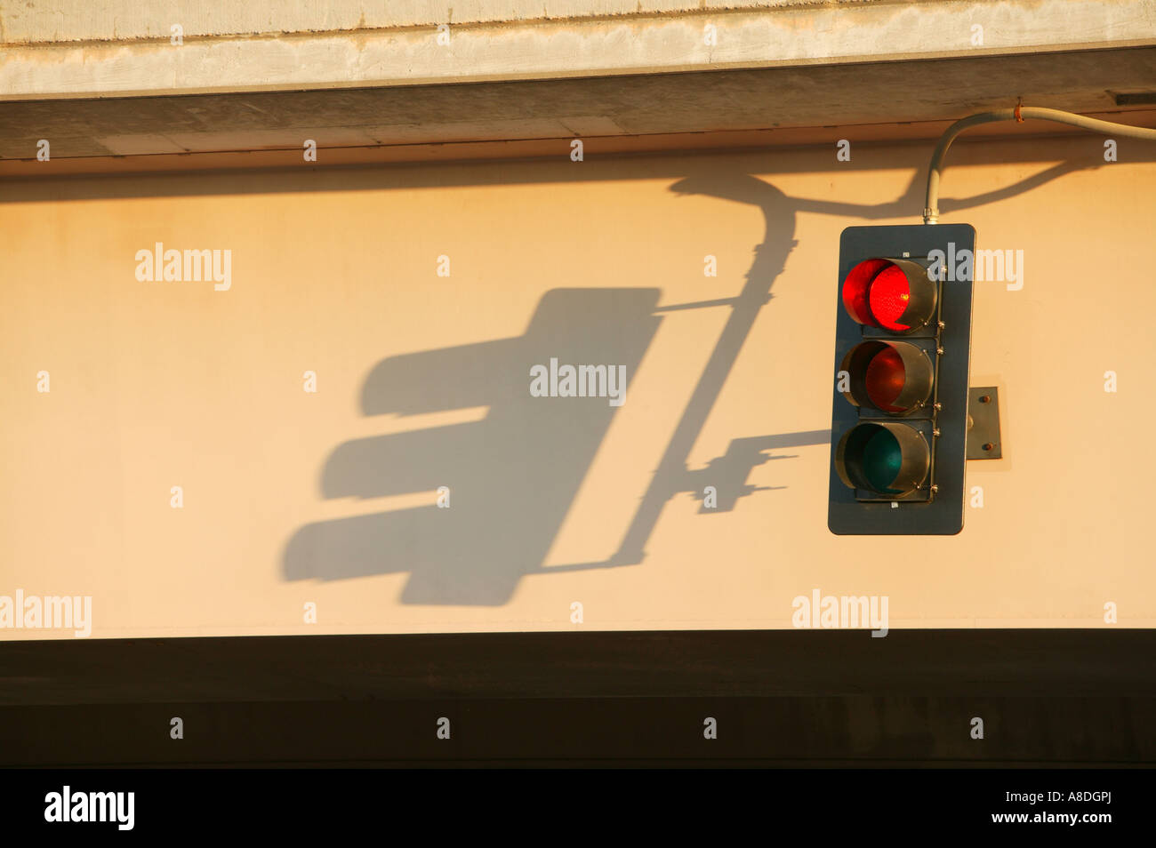 Traffic signal shadow on bridge Stock Photo - Alamy