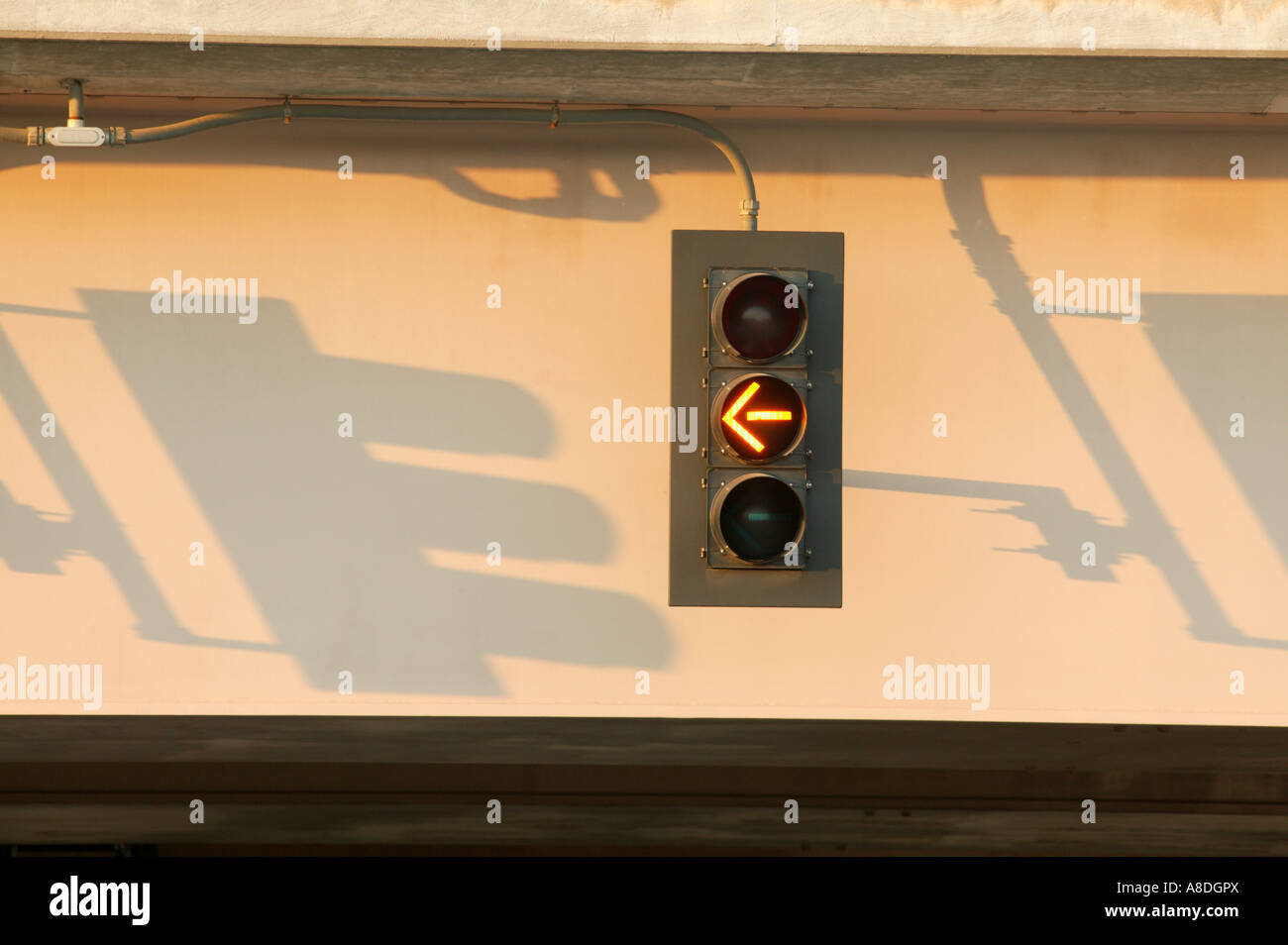 Traffic signal shadow on bridge Stock Photo - Alamy