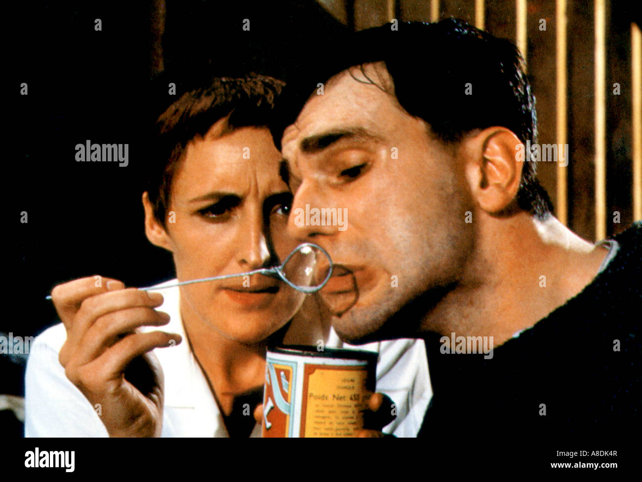 MY LEFT FOOT  - 1989 Palace film with Daniel-Day Lewis as Christy-Brown and Fiona Shaw as Dr Eileen Cole Stock Photo