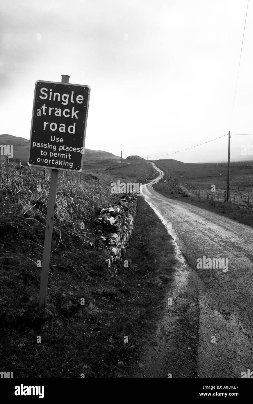 Road single track solitary highway lane roadway track view hills Isle of Mull Inner Hebrides Travel Scotland Island Isle Argyl Stock Photo