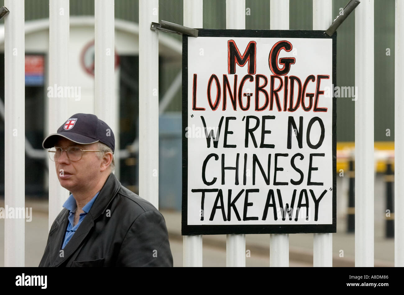 A Former Employee Protests With A Banner Outside The Mg Rover