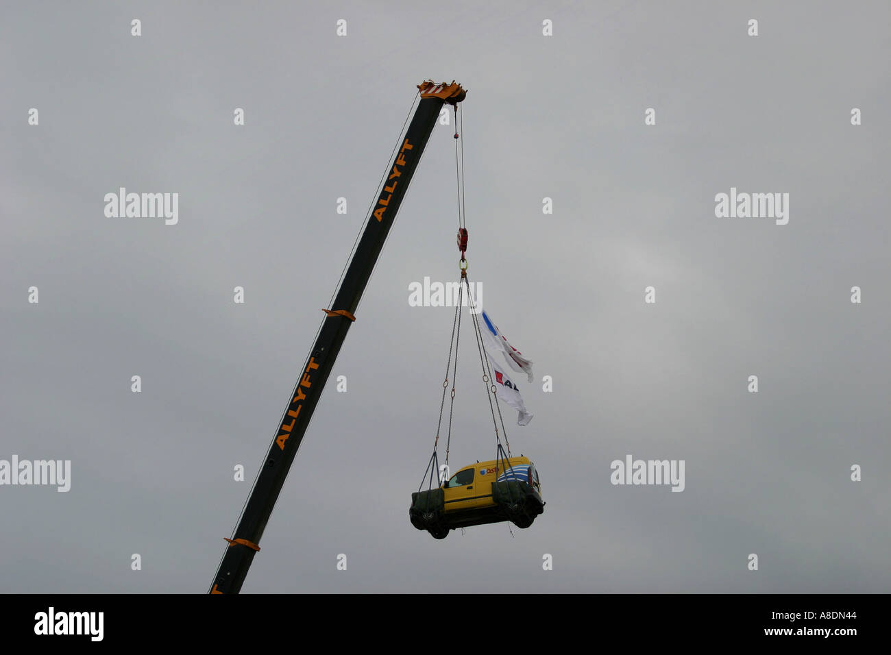 Crane with car Stock Photo Alamy