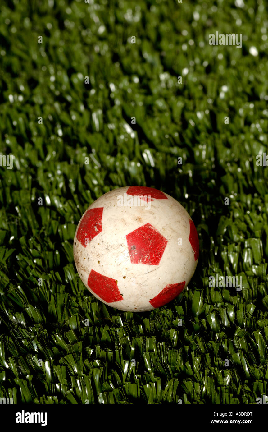 Small football on artificial grass Stock Photo Alamy