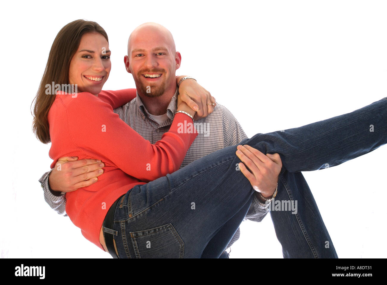 Guy holding Girl in Cradle Stock Photo Alamy