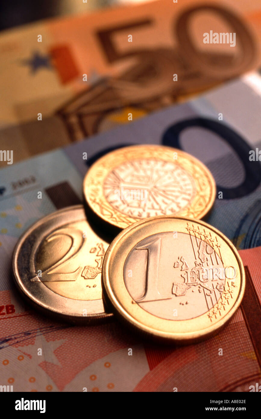 Euros and euro dollars in coin and paper form Stock Photo
