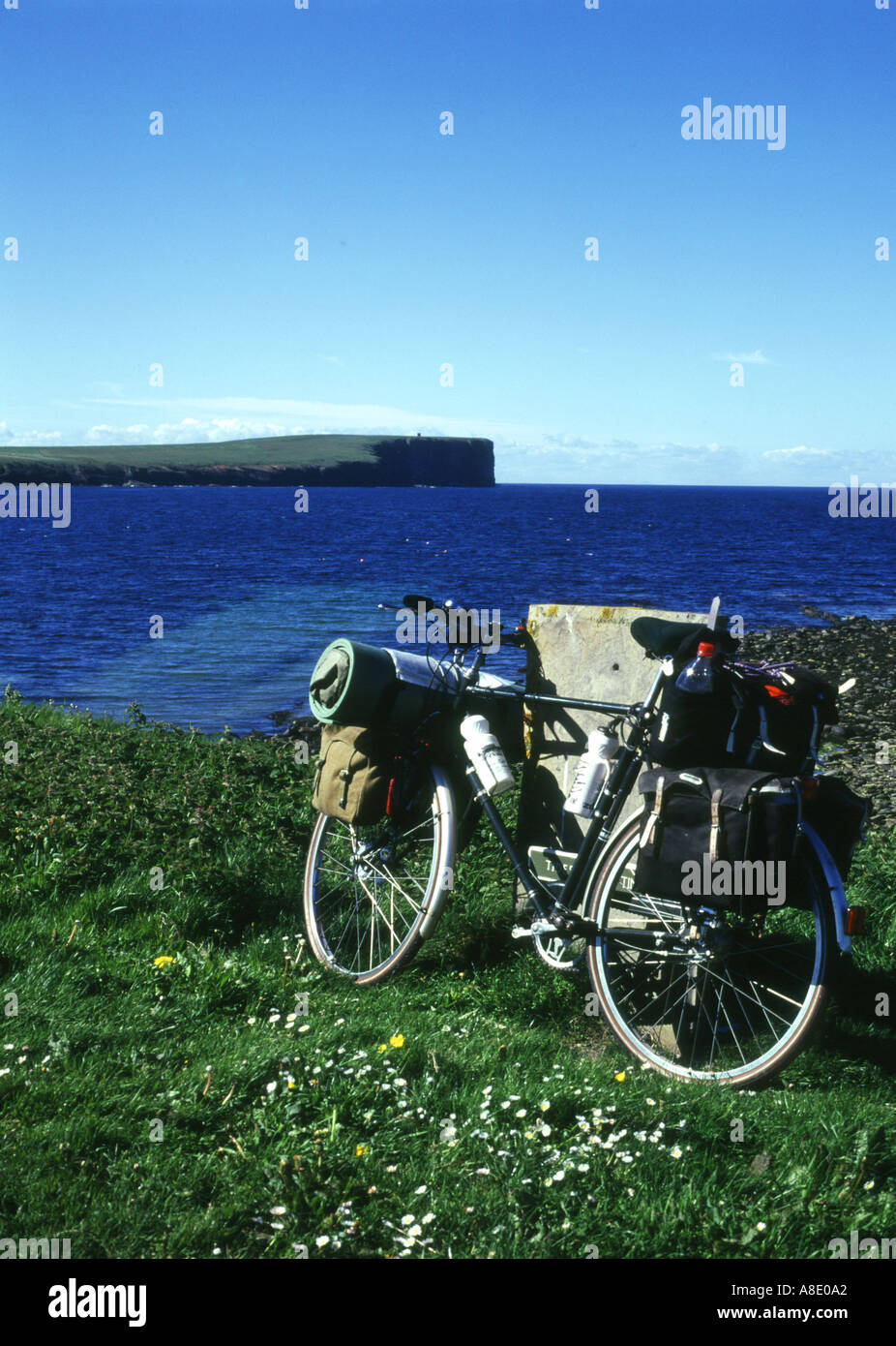 dh Birsay Bay BIRSAY ORKNEY Bicycle parked at rock Birsay bay and Marwick head uk bike nobody cycle cycling scottish islands scotland holiday Stock Photo