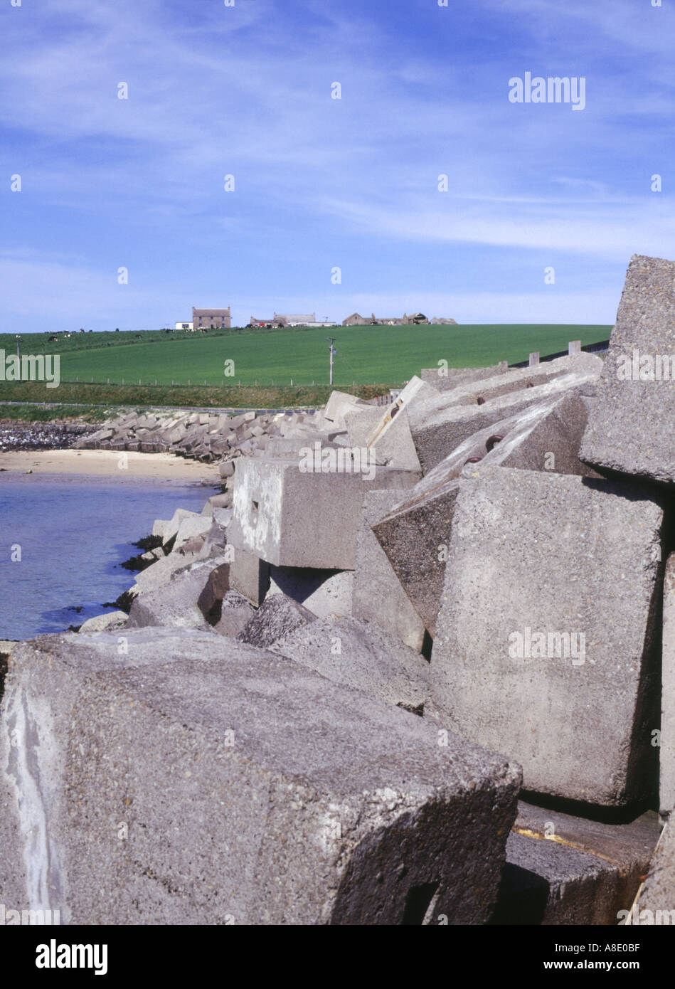 dh 4th Churchill Barrier CHURCHILL BARRIERS ORKNEY Concrete cement blocks foundations scotland historic road Stock Photo