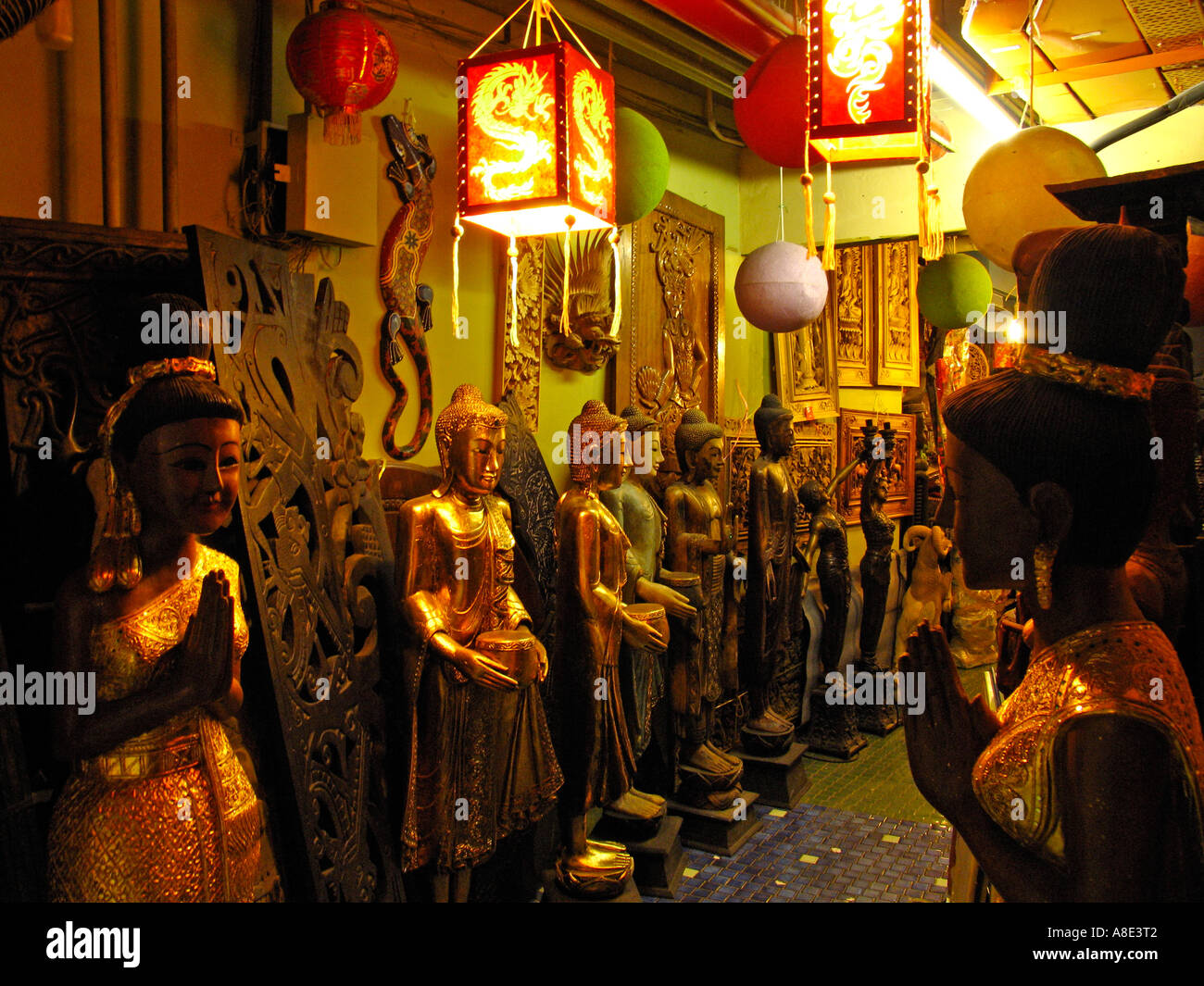 Asian shop with Buddhas Stock Photo