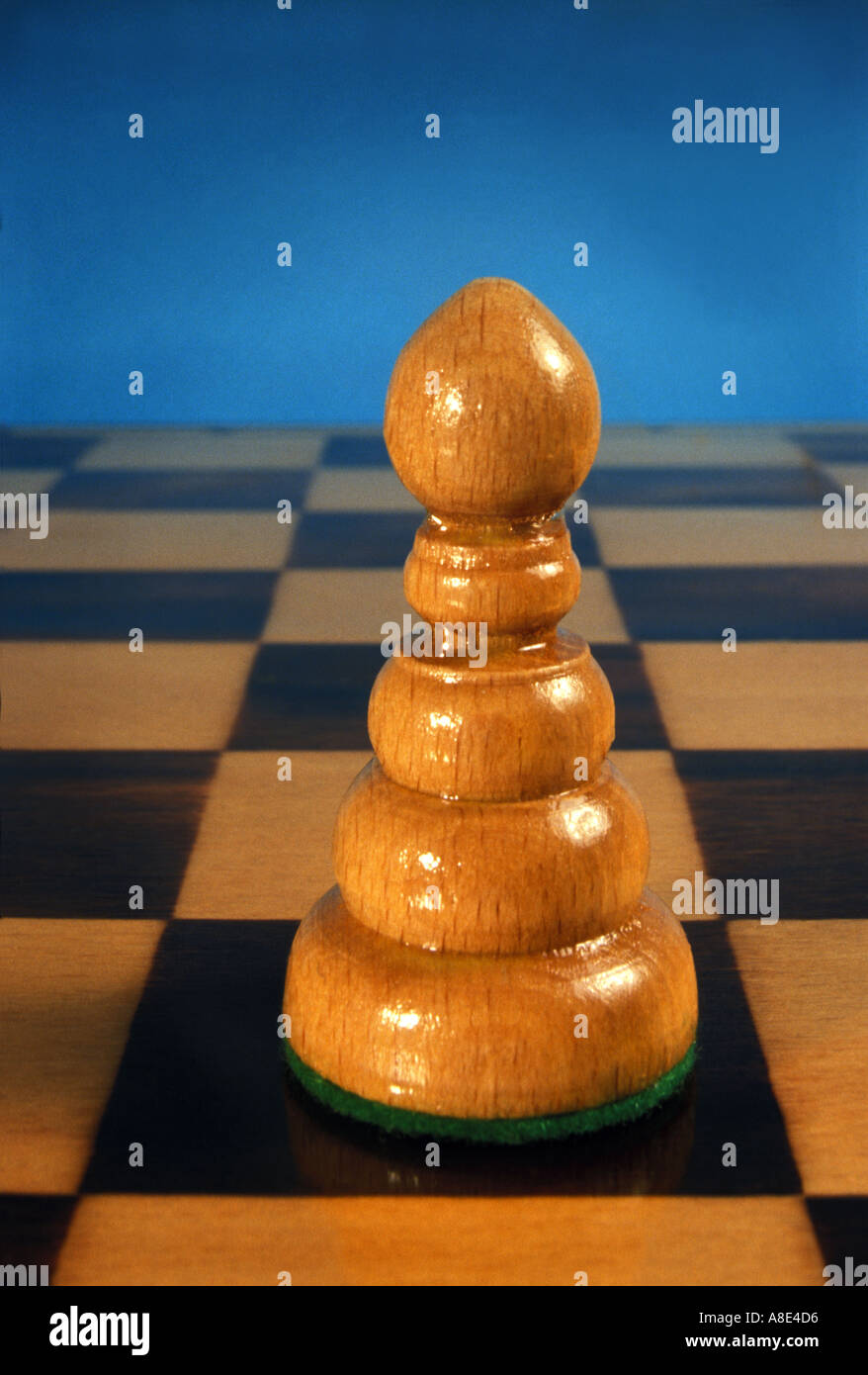 Pawn Chess Piece On Chequered Board Stock Photo Alamy