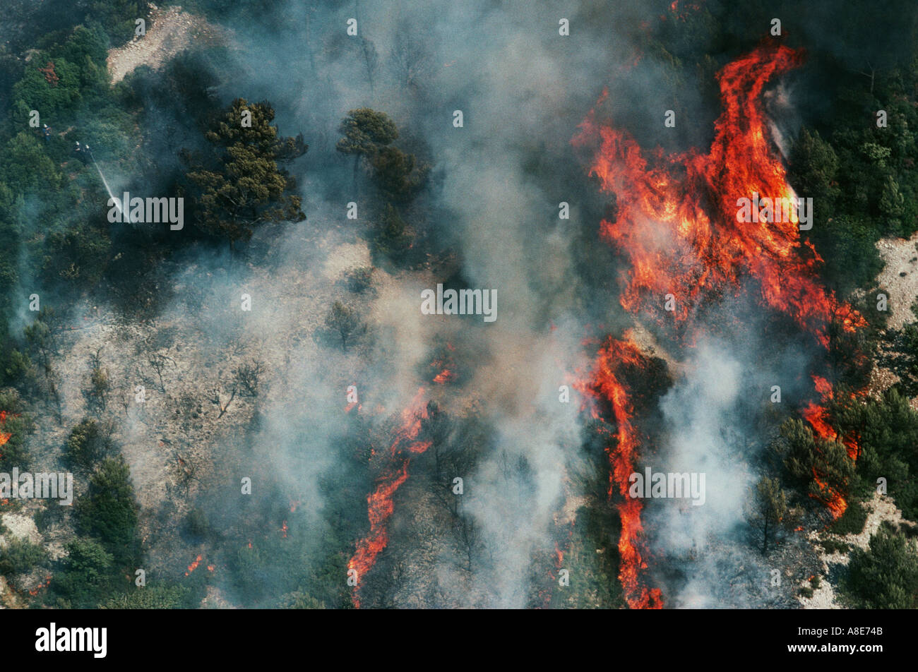 Aerial view of a wildfire, forest fire flames and smoke, Bouches-du-Rhône, Provence, France, Europe, Stock Photo
