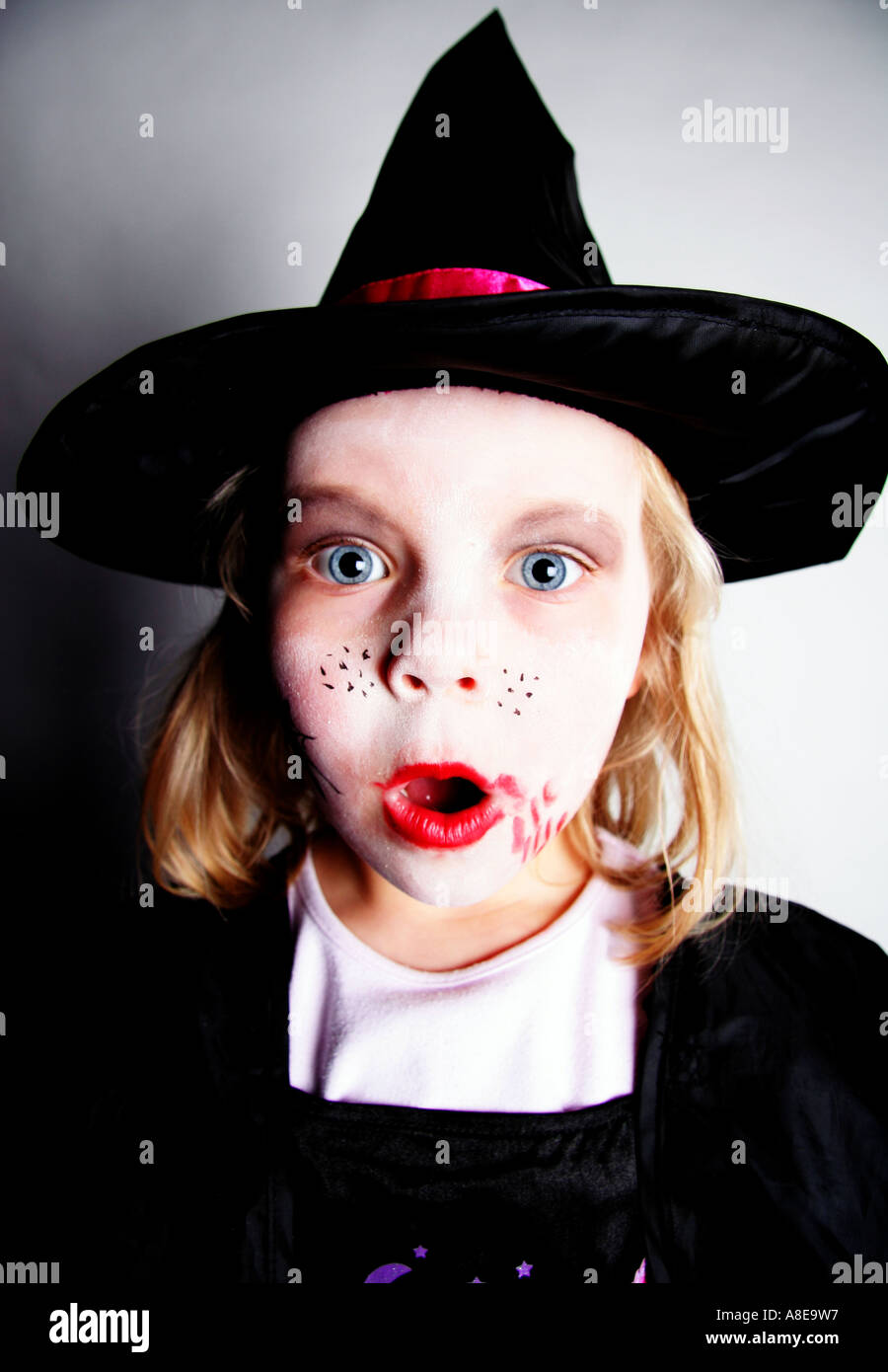 four year old girl dressed as witch Stock Photo