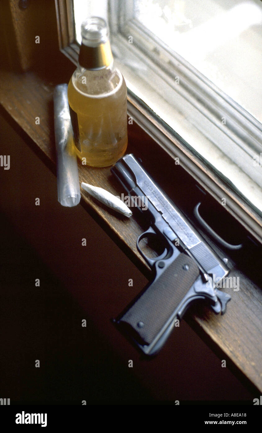 Still life of Colt .45 pistol, joint, beer, bag of marijuana. St Paul Minnesota USA Stock Photo