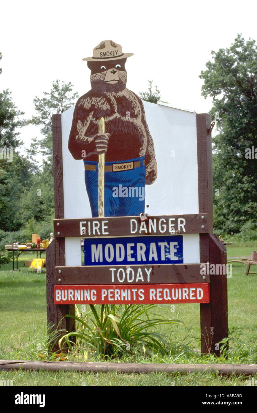 Fire danger warning sign; "Smokey the Bear." Danbury Wisconsin USA Stock Photo