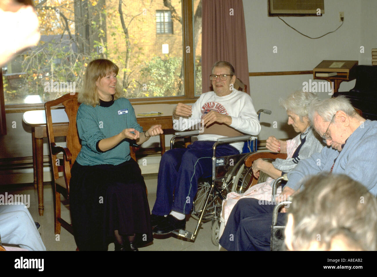 Physical therapist age 40 leading nursing home exercise class St Paul ...