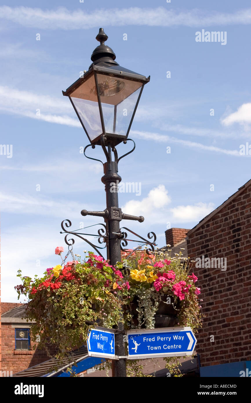 Cheshire Stockport Reddish Houldsworth Square hanging baskets on lamp post Stock Photo