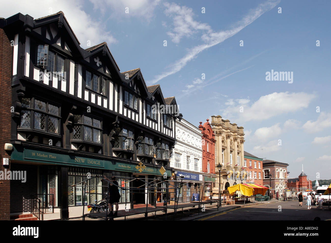 UK England Cheshire Stockport Town Centre Market Place stalls being set