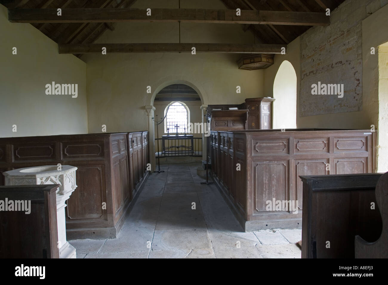 Box pews inside St Marys church in Little Washbourne some 6 miles south of Evesham Worcs UK Stock Photo