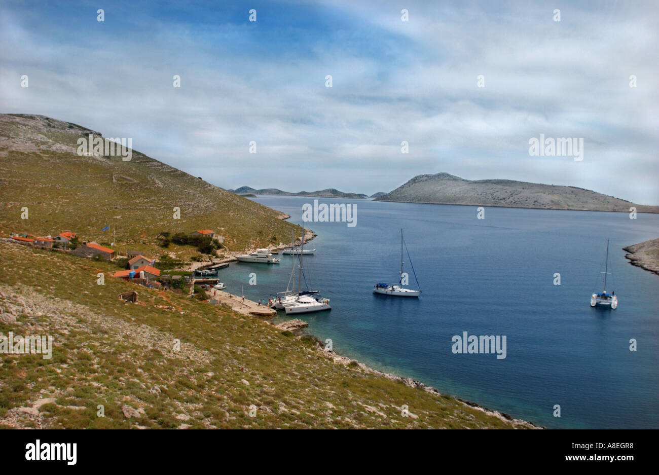 Yachts at anchor in a secluded harbour in Kornati National park Croatia Stock Photo