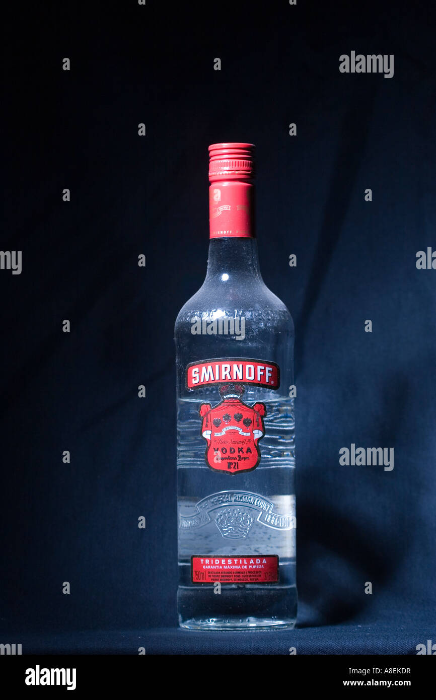 Bottle of Smirnoff vodka isolated on black background Stock Photo - Alamy