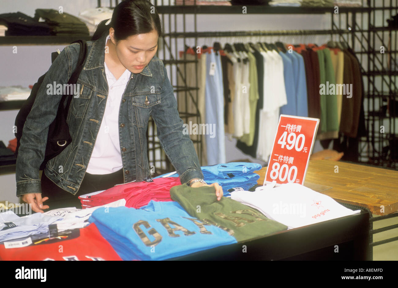 Chinese Young Woman Clothes Shopping At The Gap Taiwan Republic Of China Stock Photo