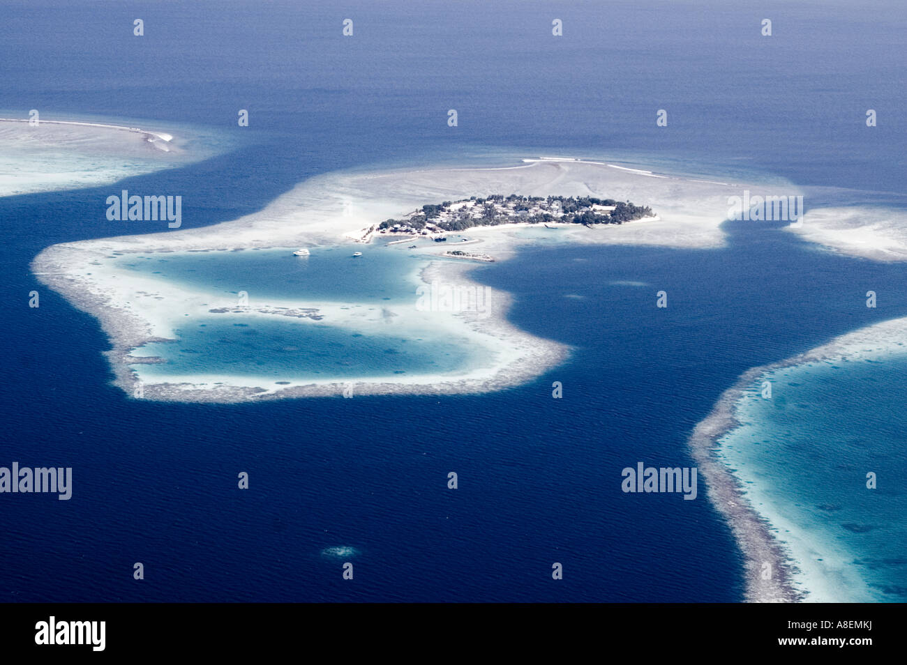 Aerial view of a tropical coral island, Maldives Stock Photo - Alamy