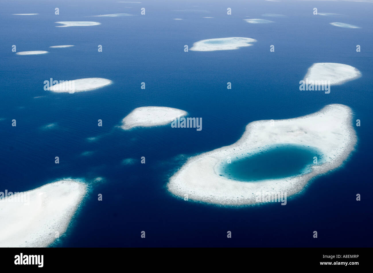 Aerial view of a tropical coral island, Maldives Stock Photo - Alamy