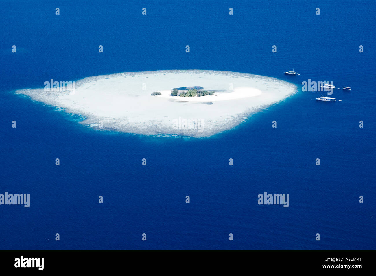 Aerial view of a tropical coral island, Maldives Stock Photo - Alamy