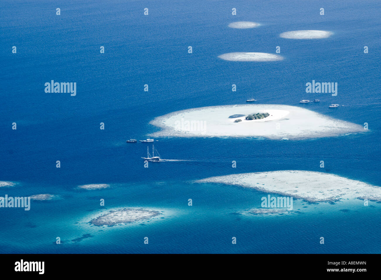 Aerial view of a tropical coral island, Maldives Stock Photo - Alamy