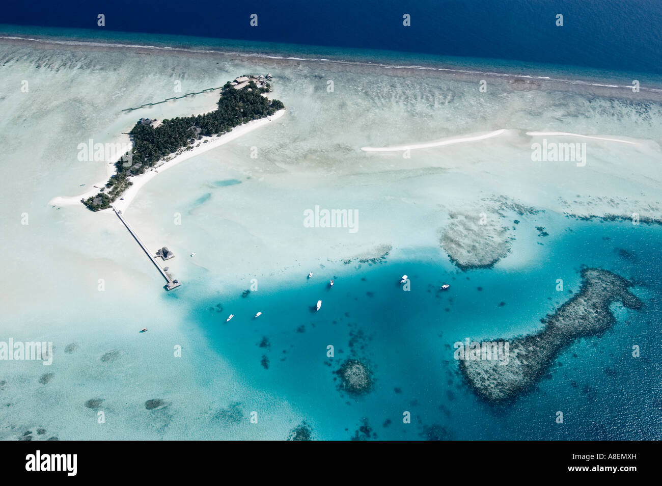 Aerial view of a tropical coral island, Maldives Stock Photo - Alamy