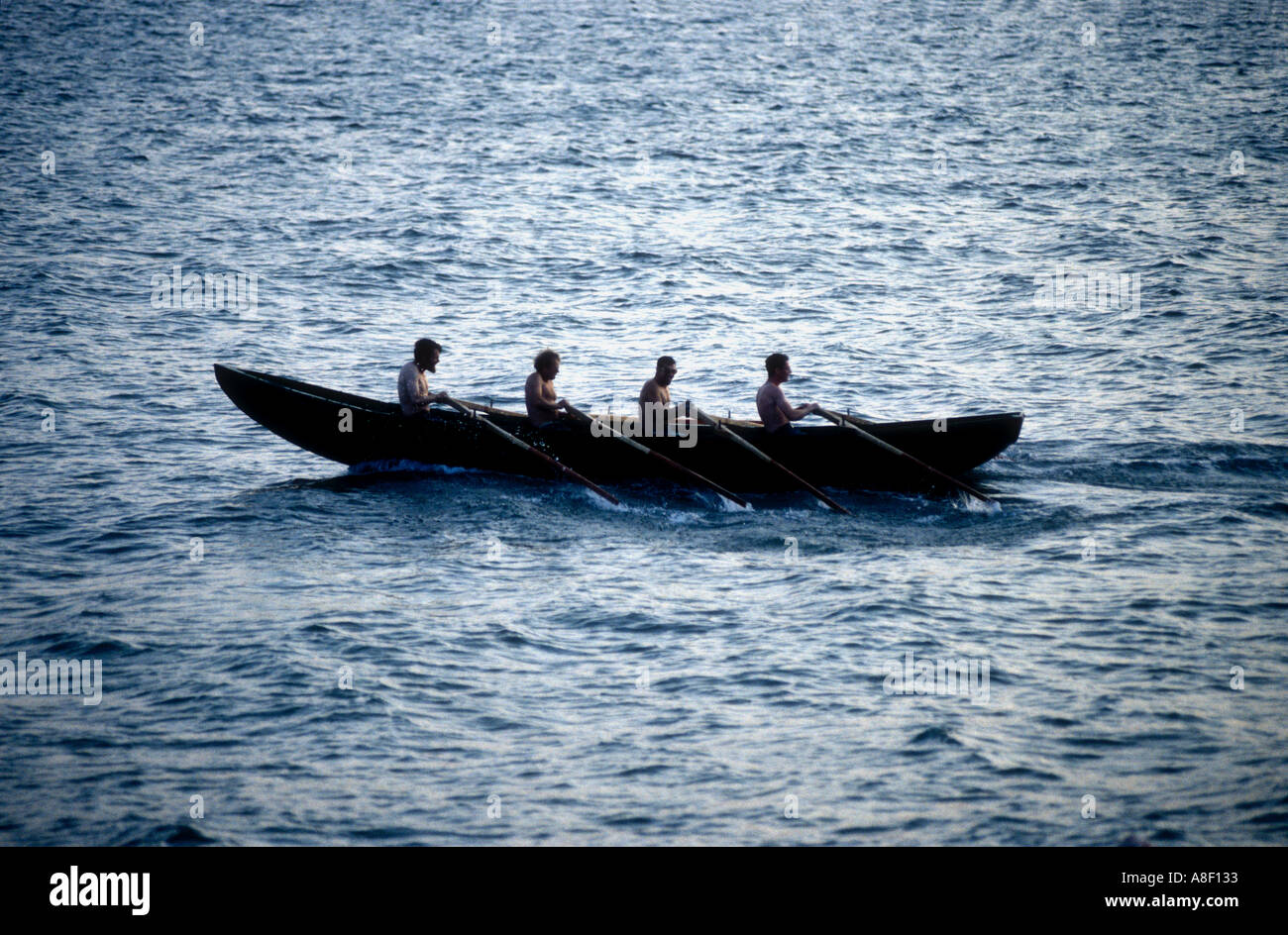 Men rowing a Kerry currach in the Republic of Ireland Stock Photo - Alamy