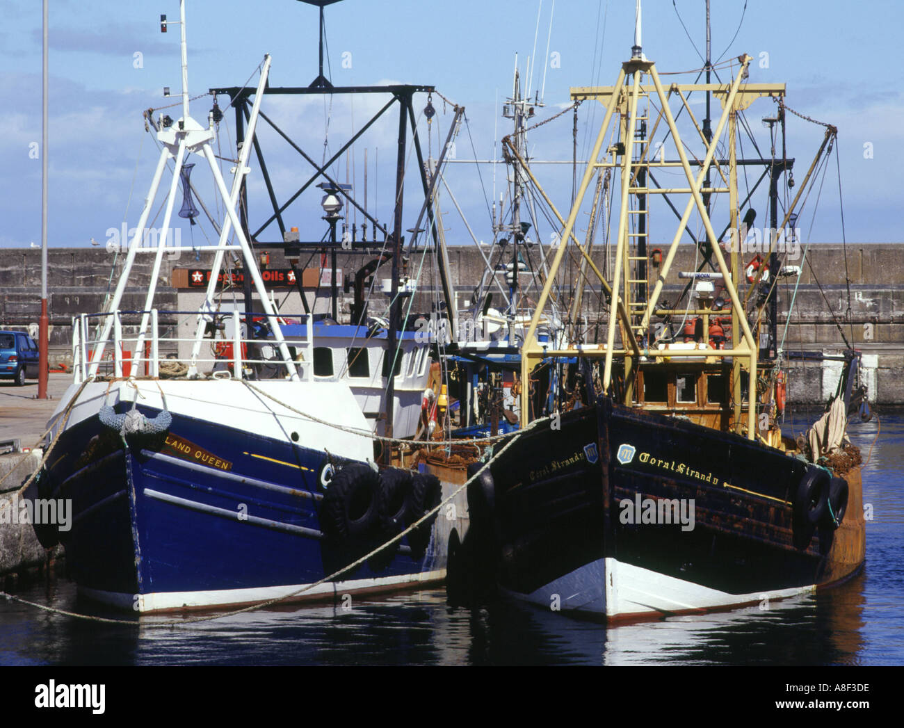 dh  BUCKIE MORAY Fishing boats in harbour scotland alongside fish boat industry uk fishery Stock Photo