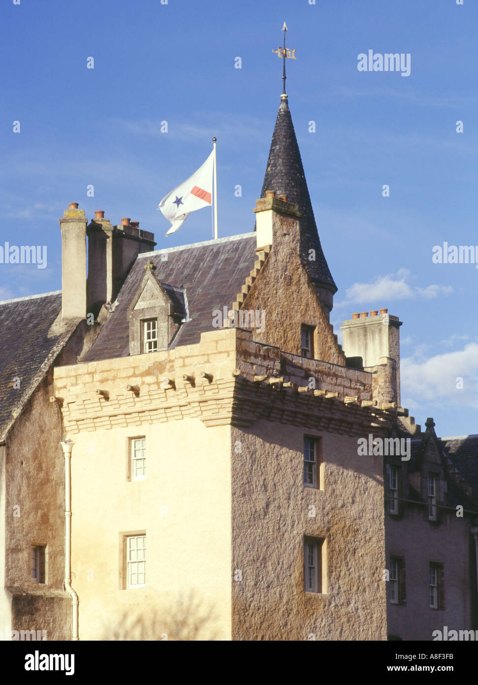 dh BRODIE CASTLE MORAY Scottish Tower house castle with family clan flag scotland highland Stock Photo