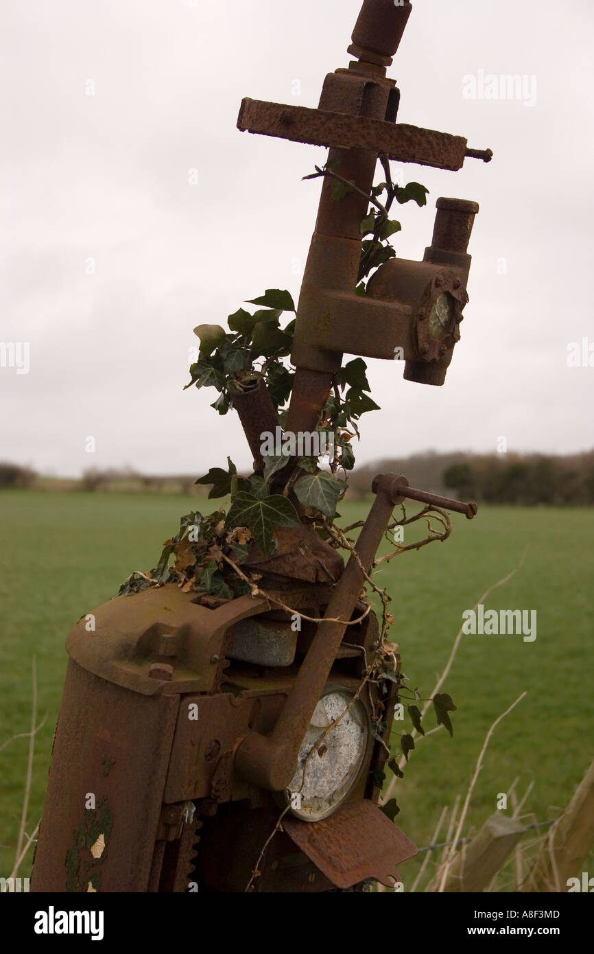 Rusting fuel pump in field Stock Photo