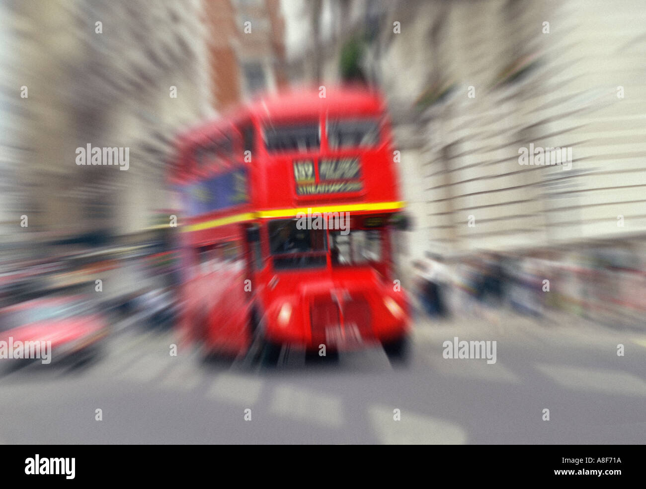 London red double-decker bus speeding down Whitehall Stock Photo - Alamy