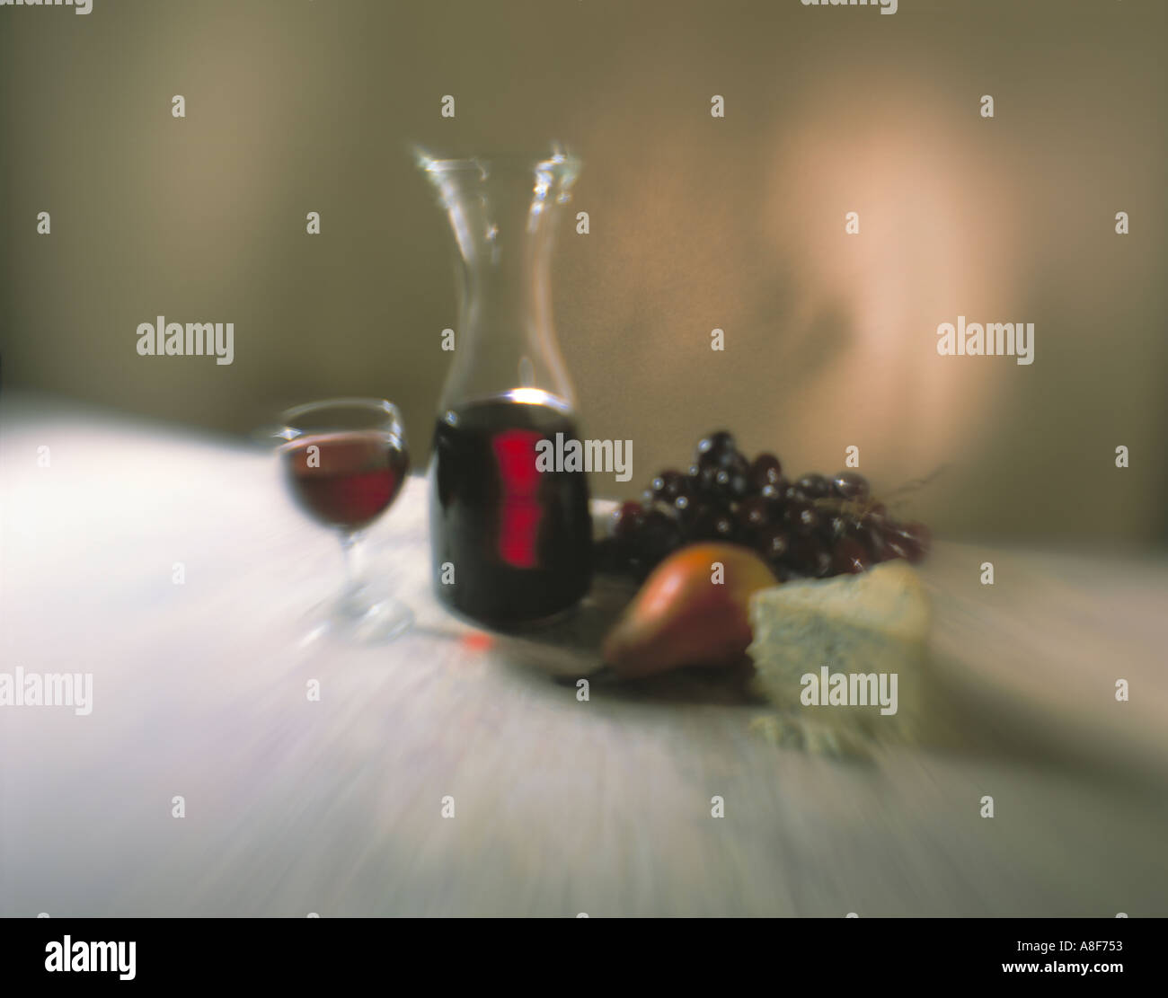 Wine still life with grapes, fruit and cheese Stock Photo - Alamy