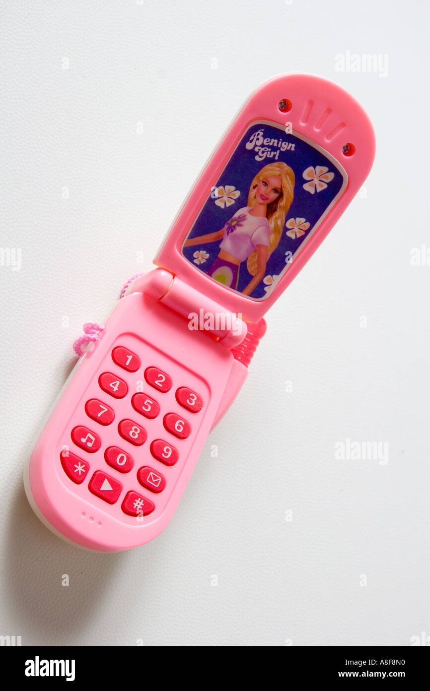 mobile phone, pink, toy, Barbie, girl, play, buttons, design, screen, plastic, close up, white background Stock Photo