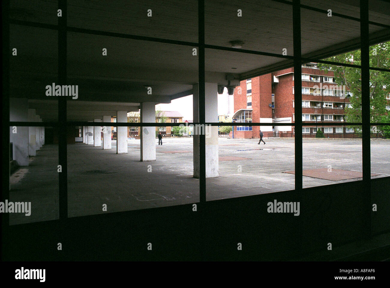 Broken windows on the Caledonian Housing Estate in London UK Stock